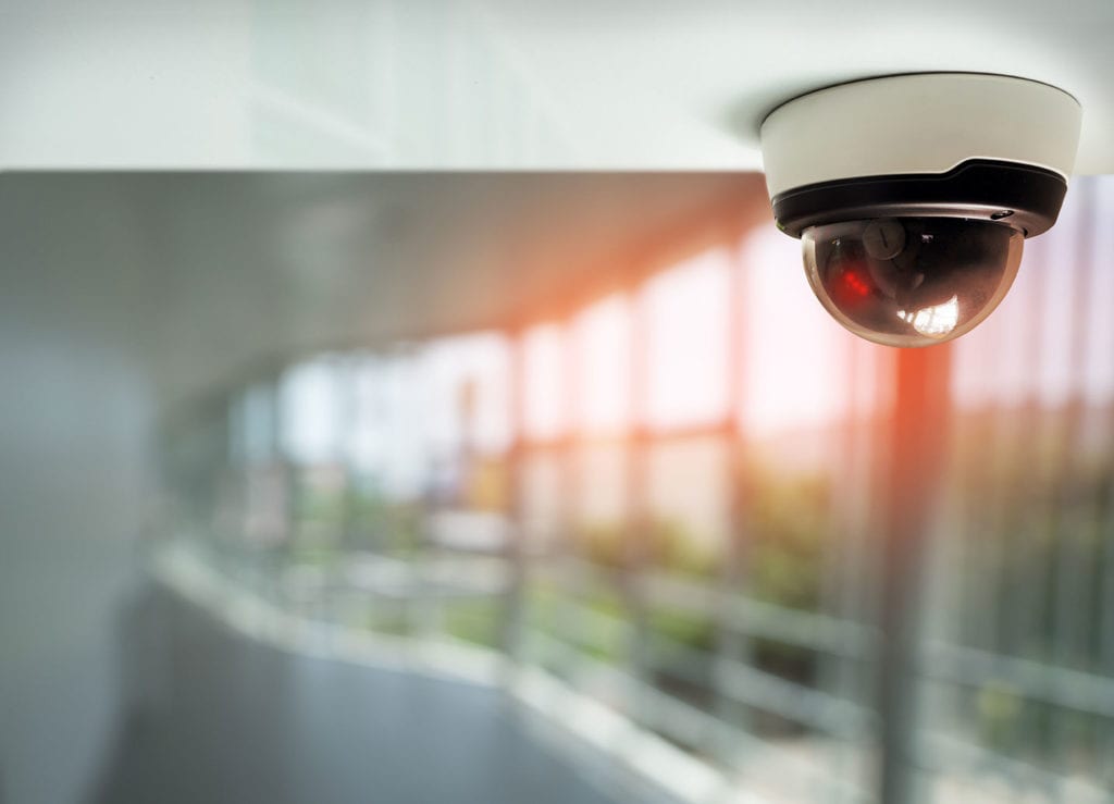 CCTV camera installed on a building's ceiling. CCTV camera installed on a building's ceiling.