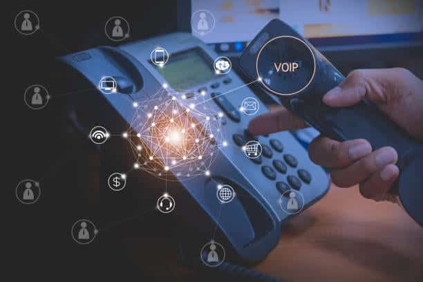 A person is using a phone for phone services. A person is using a phone for phone services.